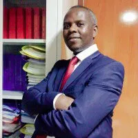 Portrait of Muhangi George, Managing Partner/Advocate